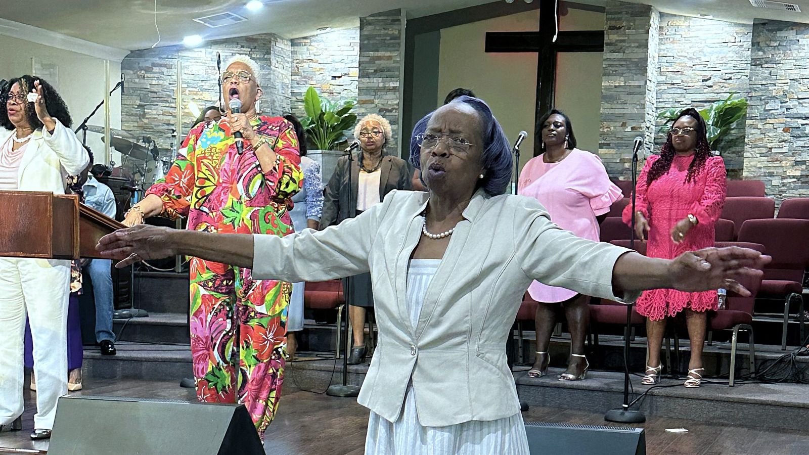 Worship leaders and the congregation praising God
